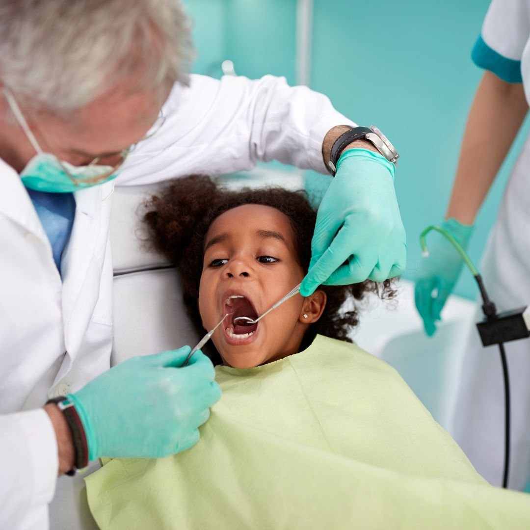 Child being treated by a paediatric dentist